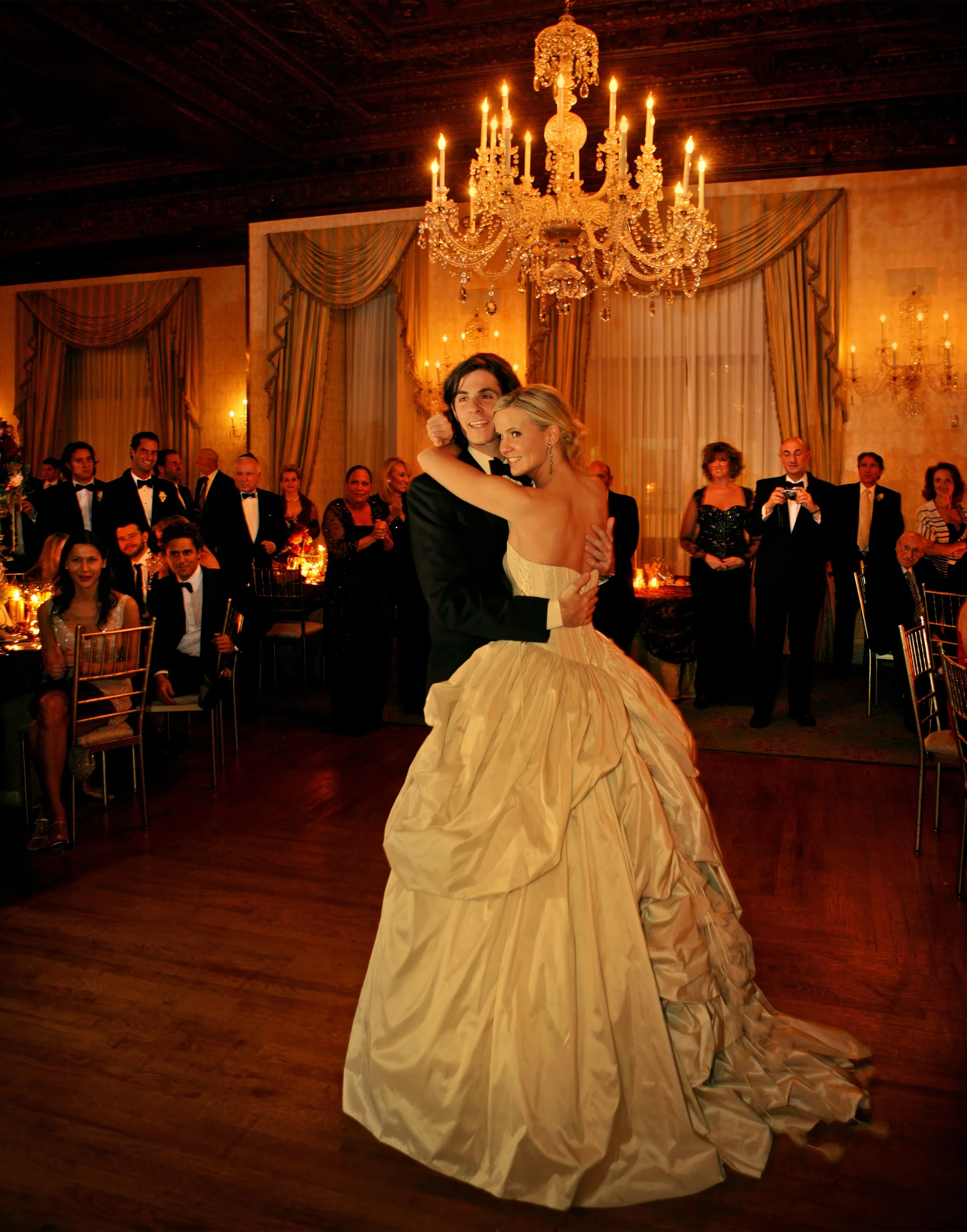 Couple first dance with dramatic spotlight